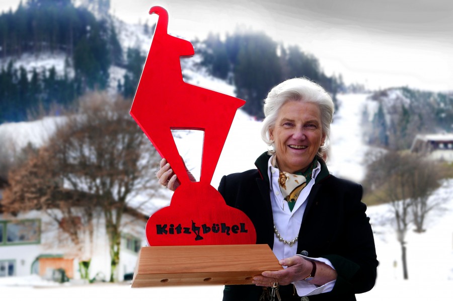Signe Reisch with Kitzbuhel logo at foot of Streif