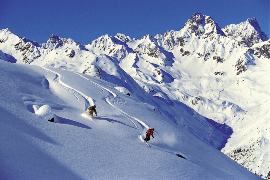 Skiers in fresh powder at Ischgl