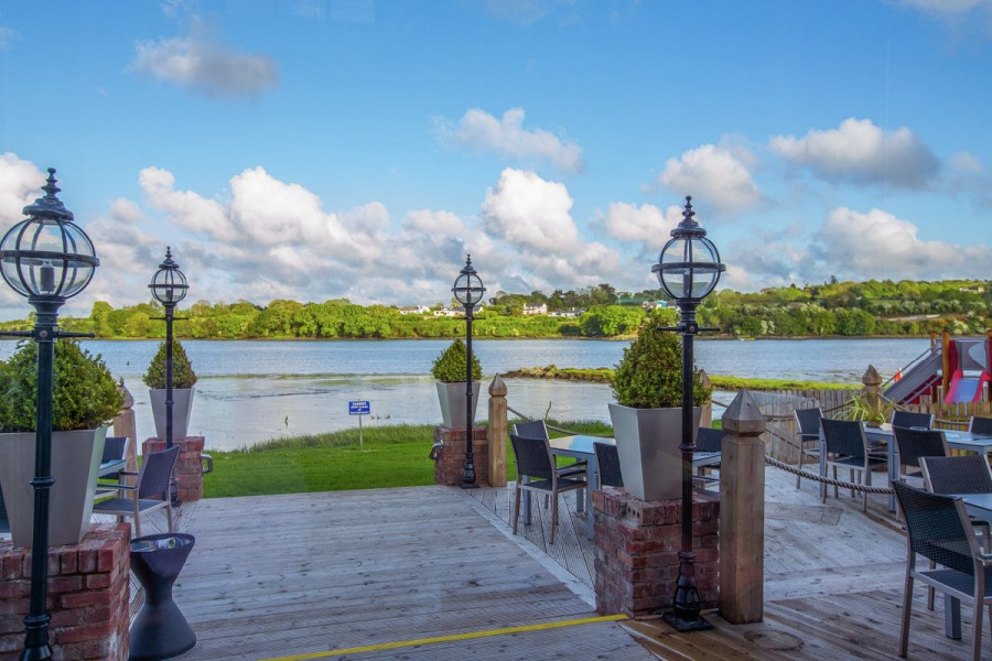 Deck at Ferrycarrig Hotel connects with the waterfowl rich Slaney river estuary.