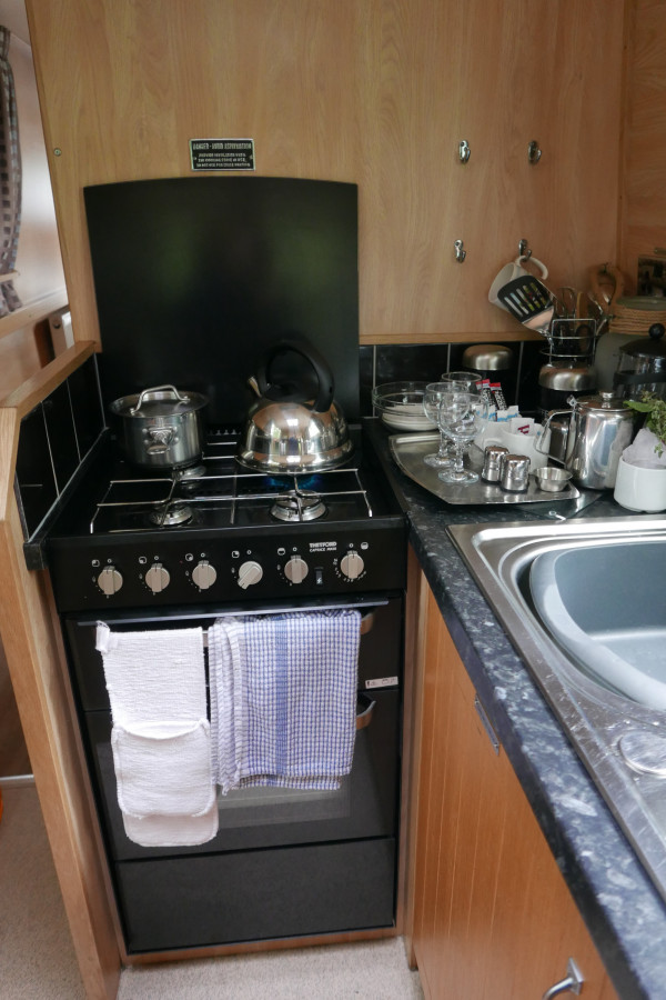 The compact and well equipped kitchen.