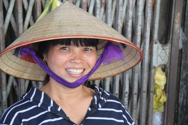 Ho Chi Minh City insider travel guide smiling Vietnamese girl