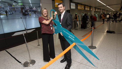 GATWICK AIRPORT'S GUY STEPHENSON AND EASYJET'S SOPHIE DEKKERS OPEN THE WORLD'S LARGEST SELF SERVICE BAG DROP TODAY.