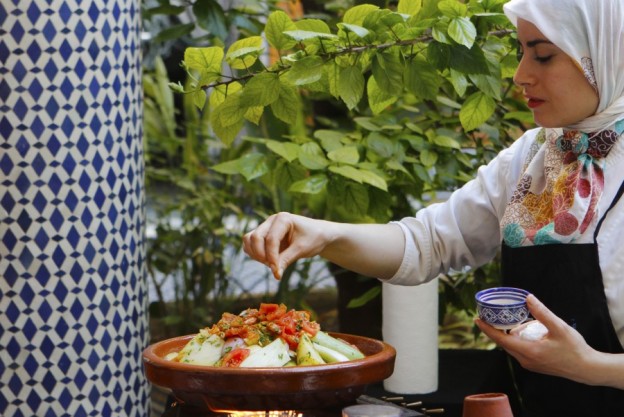 Michael Edwards learns some of the secrets of Moroccan cuisine after a culinary master class at the Fez Cooking School. 3 cooking in fez photo by omar chennafi please credit 24045816877 o