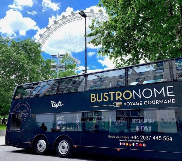 Andy Mossack reviews Bustronome Voyage Gourmand, where you can enjoy dinner while touring London atop a red London double decker bus. Bus e1580301110824