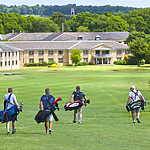 Lucy Daltroff gets to practise  her golf swing at  the Trackmen driving range,  during her visit  to the Belton Woods Hotel in Lincolnshire.