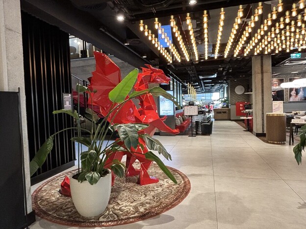 Anthea Gerrie Is Greeted By A Giant Red Dragon At The Radisson Red, Krakow’s Newest Style Hotel