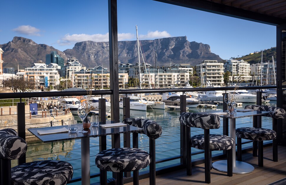 Sarah Kingdom dines at COY in Cape Town’s V&A Waterfront and discovers an award-winning harbour-side experience, where flavours and seasons meet with quiet confidence.