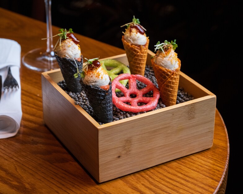 As Kinky Boots meets Colonel Saab, Andy Mossack reviews another tasty dining/theatre combination.