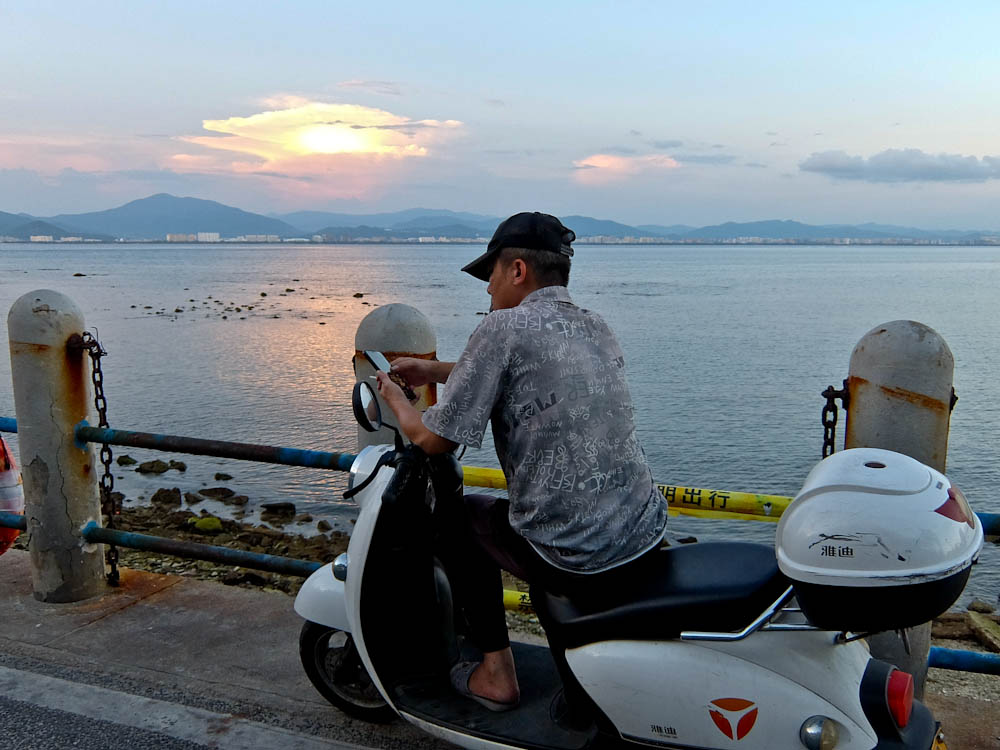 In The Tropical Island Of Hainan, Rupert Parker discovers rainforests, space launches and ethnic diversity.