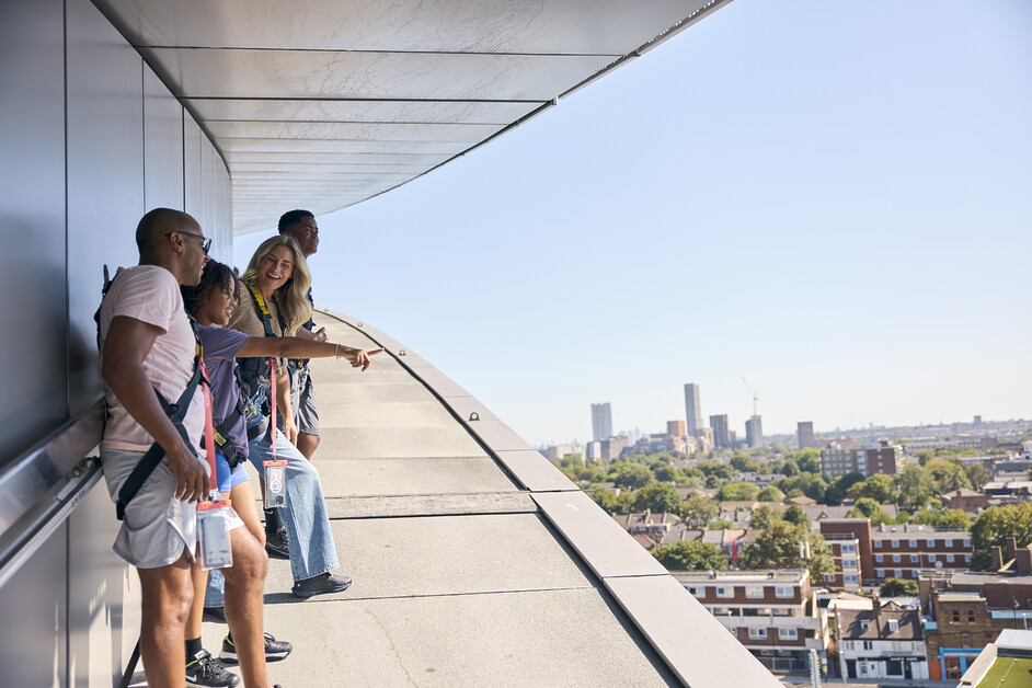 Andy Mossack enjoys a morning out with the family on the Dare Skywalk almost 50 metres above the ground at the top of the Spurs stadium.
