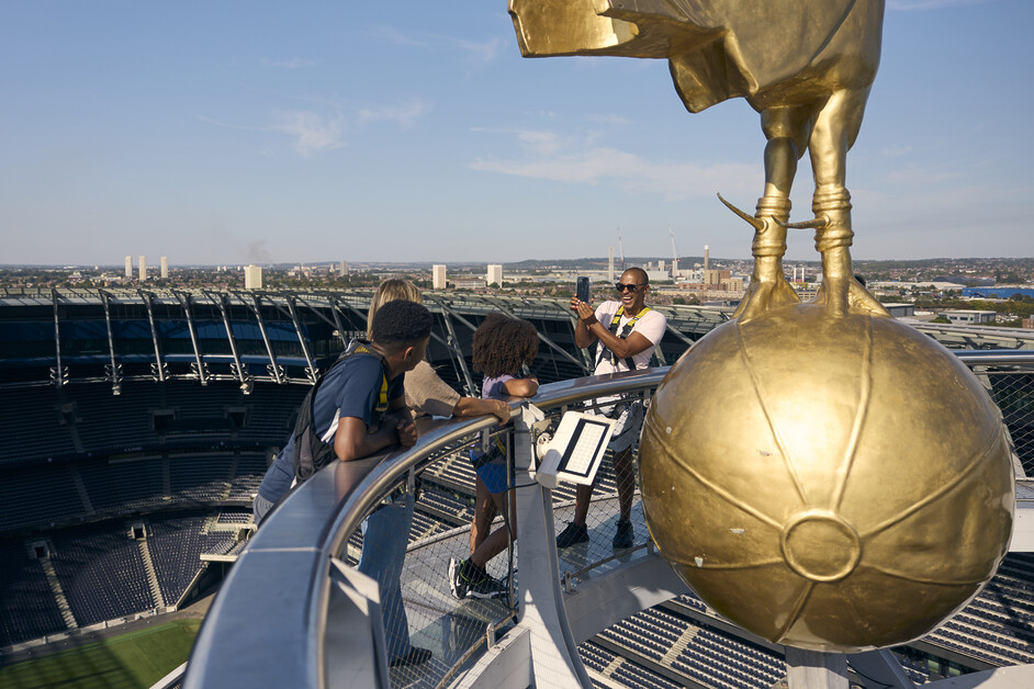 Andy Mossack enjoys a morning out with the family on the Dare Skywalk almost 50 metres above the ground at the top of the Spurs stadium.